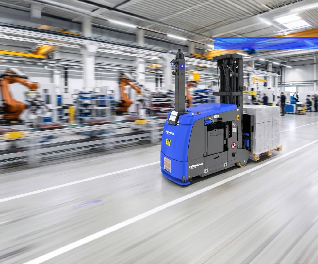 Formova CB2500 automated guided vehicle (AGV) going across a warehouse.