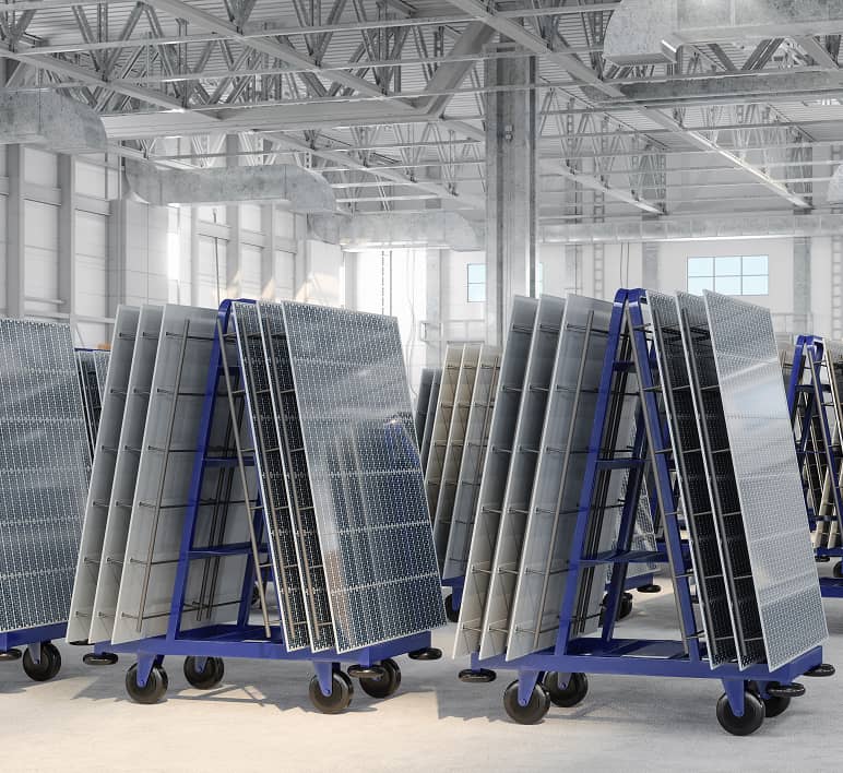 A large manufacturing facility filled with production equipment and automated machinery demonstrates industrial automation solutions.