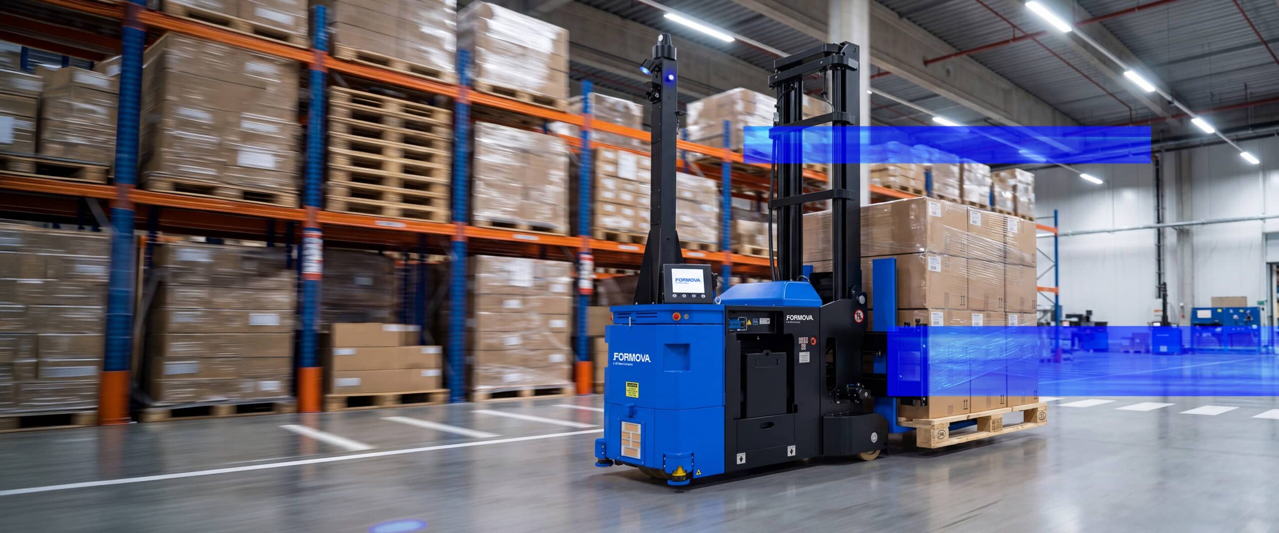 A Formova CB4500 automated guided vehicle (agv) transports a pallet through a warehouse aisle