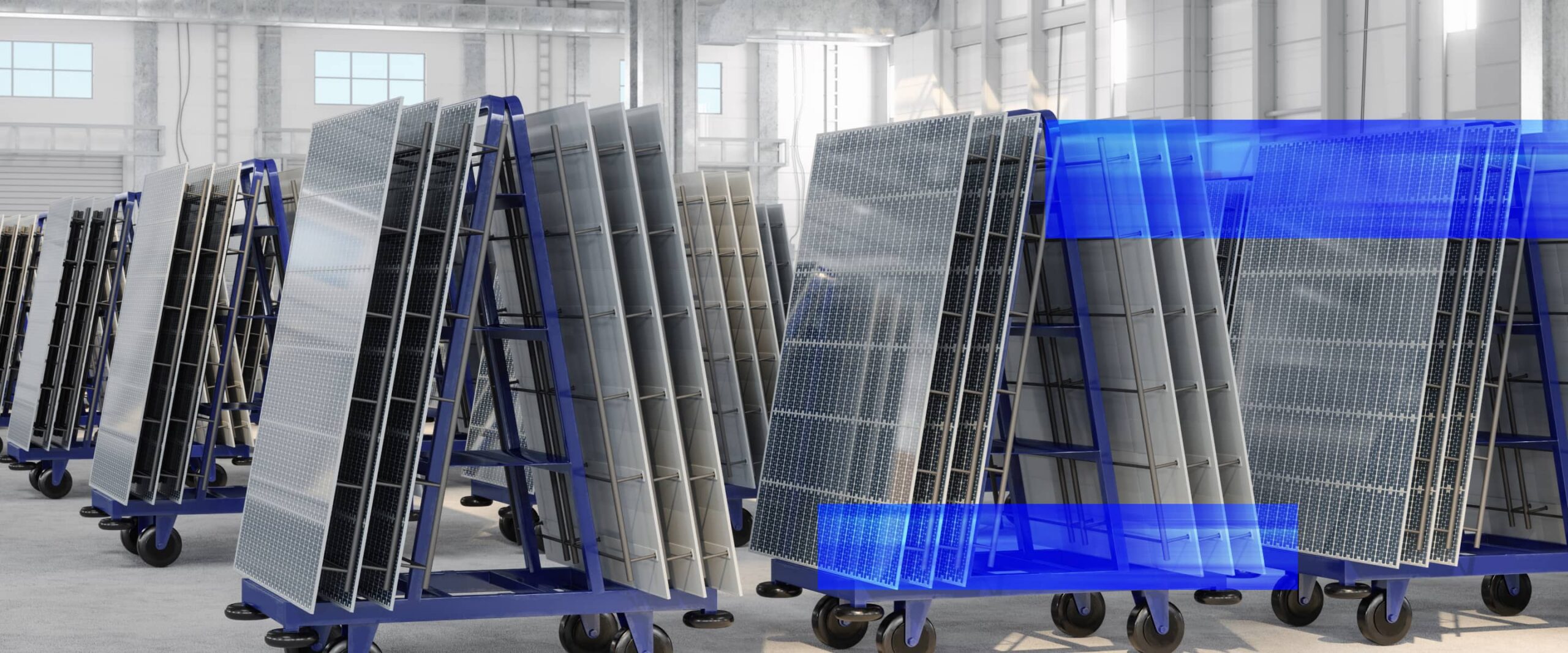 A large manufacturing facility filled with production equipment and automated machinery demonstrates industrial automation solutions.