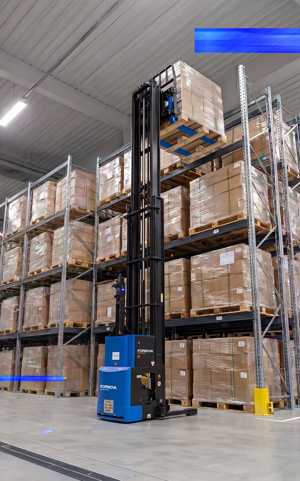 A Formova reach automated guided vehicle (agv), lifts a pallet to a high storage rack position